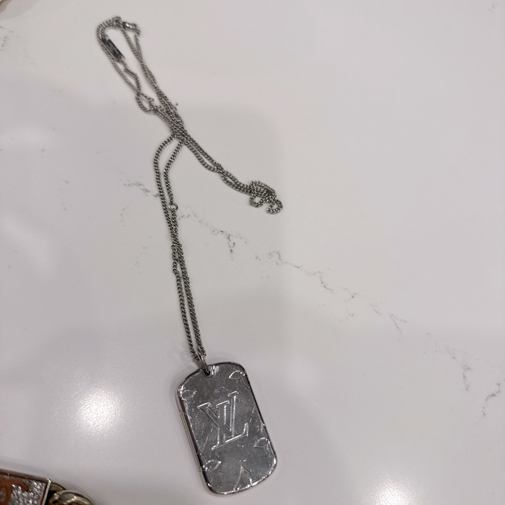 LOUIS VUITTON 
Monogram Locket Necklace